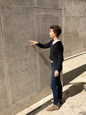 In front of the ?mur des noms?, the ?Wall of Names?, where Melanie Levensohn is listed.